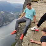 Trevor-sitting-on-the-edge-of-the-world-pulpit-rock-norway