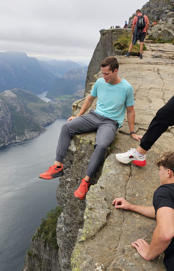 Trevor-sitting-on-the-edge-of-the-world-pulpit-rock-norway