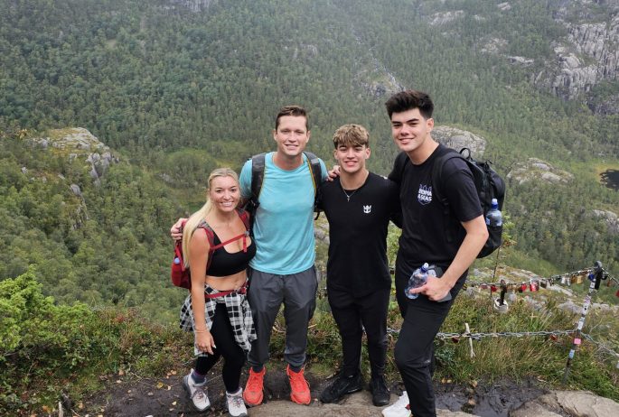 best-hikes-in-norway-pulpit-rock-here-with-chealsea-trevor-alex-diego
