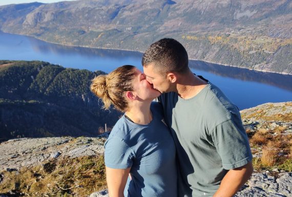 A_happy_couple_on-the_top_of_Florli_with-a-view-of-Lysefjorden A_happy_couple_on-the_top_of_Florli_with-a-view-of-Lysefjorden