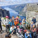Best-hikes-norway-Hiking-up-kjerag-norway-a-must-do-in-stavanger-troll-adventure-here-with-a-group-from-south-korea(2) Guided hiking group on Kjerag above Lysefjord, Norway
