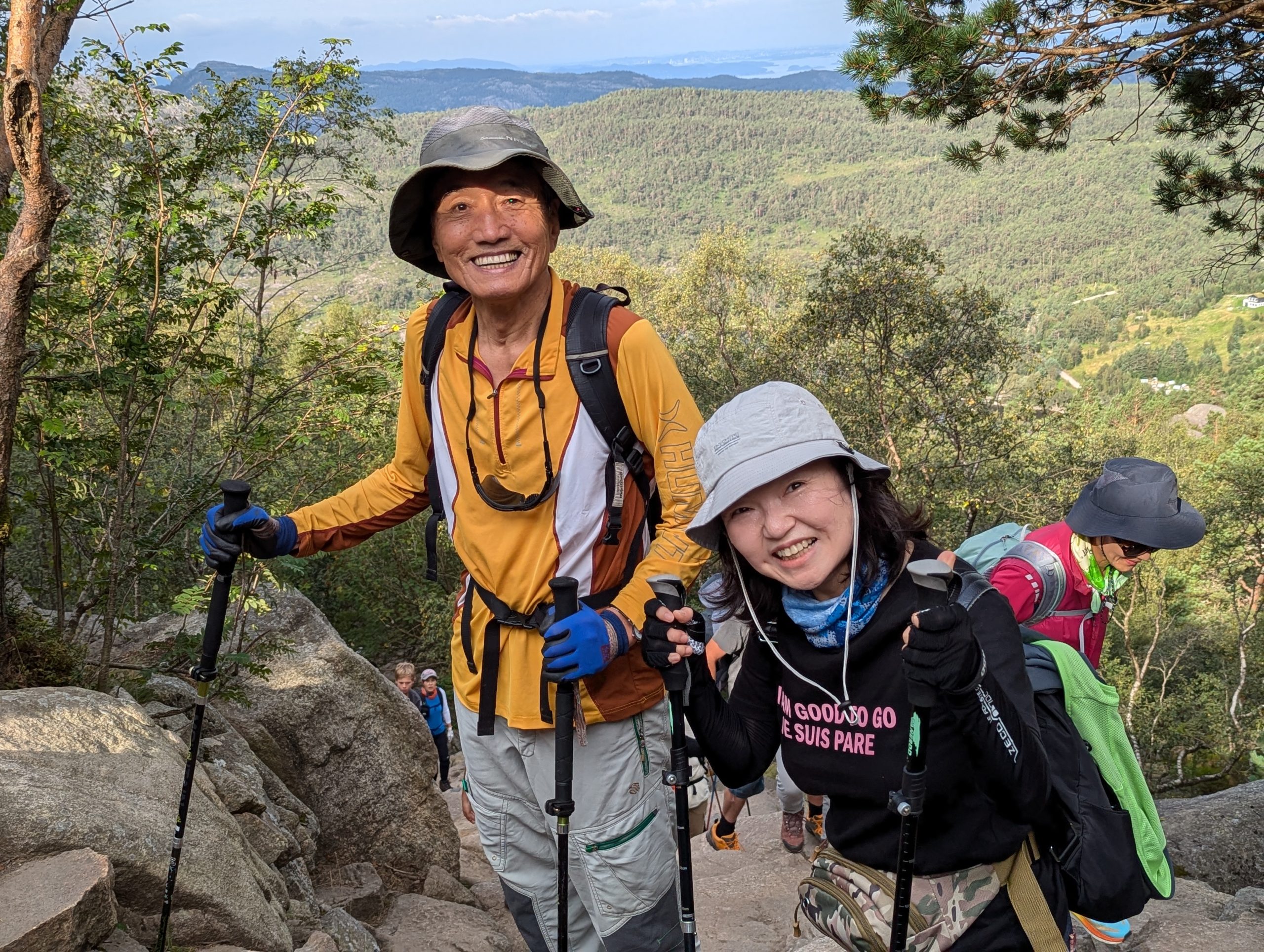 Hiking group on the Pulpit Rock plateau above Lysefjord, Norway